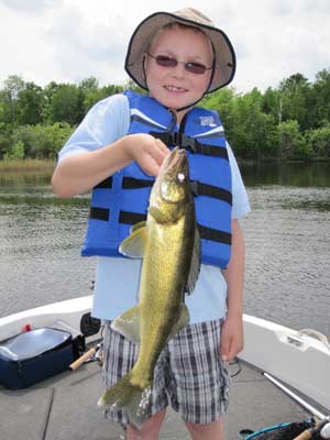 little boy caught a big walleye